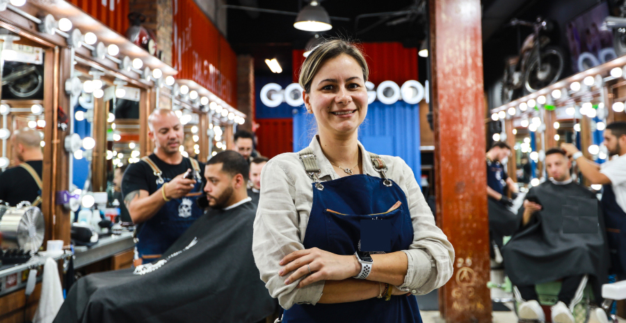 woman smiling in a small business Miami